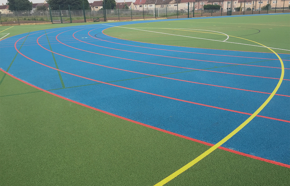 Image of a multisport games area with running track lines
