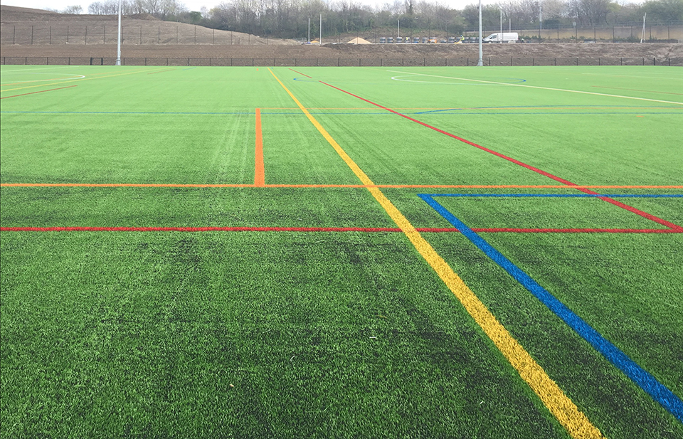 Image of an attractive blue professional standard running track