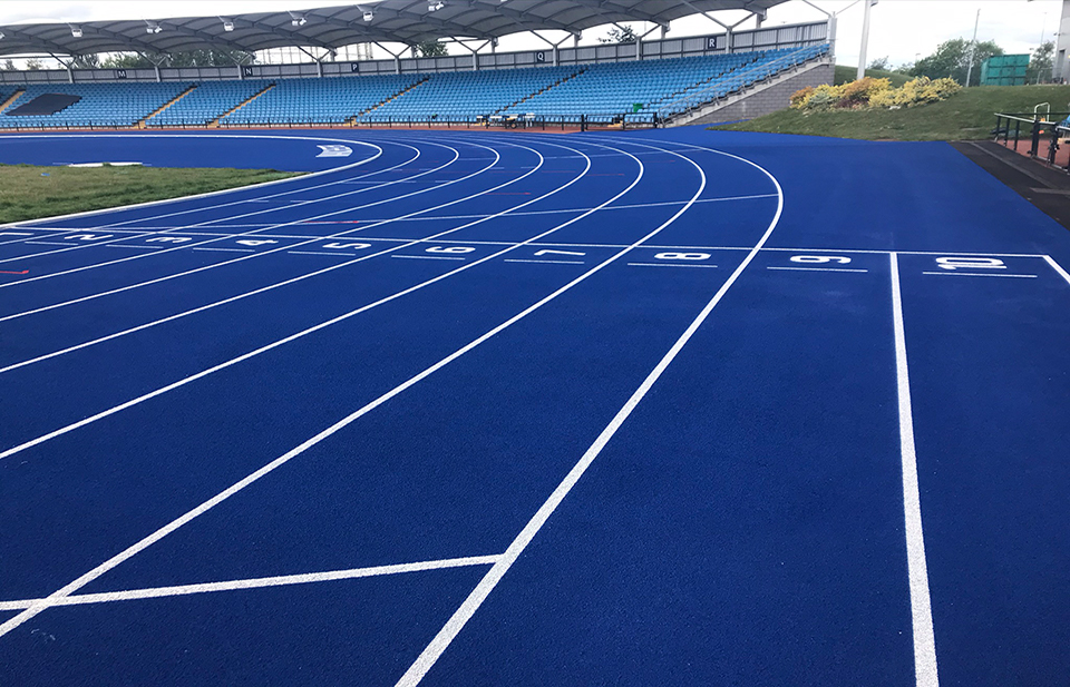 Image of an attractive blue professional standard running track